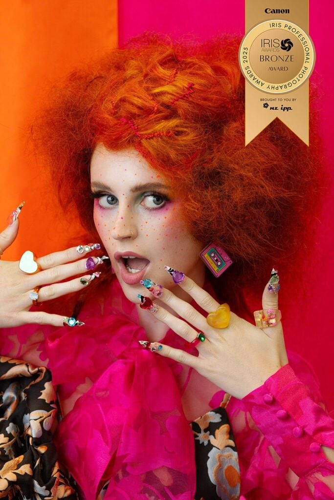 Vibrant rainbow hair and playful fashion portrait from the FROOTLOOPS collection by Shannon Dowd, NZ Hair Awards, Iris Awards bronze winner, photographed by Kate Ryan in Waikato, New Zealand.